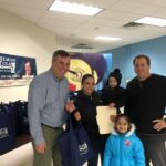 Ryan and Rob with Family at turkey giveaway